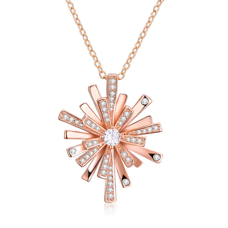 Silver Christmas snowflake necklace with diamond accents, featuring intricate snowflake design and sparkling gemstone details.