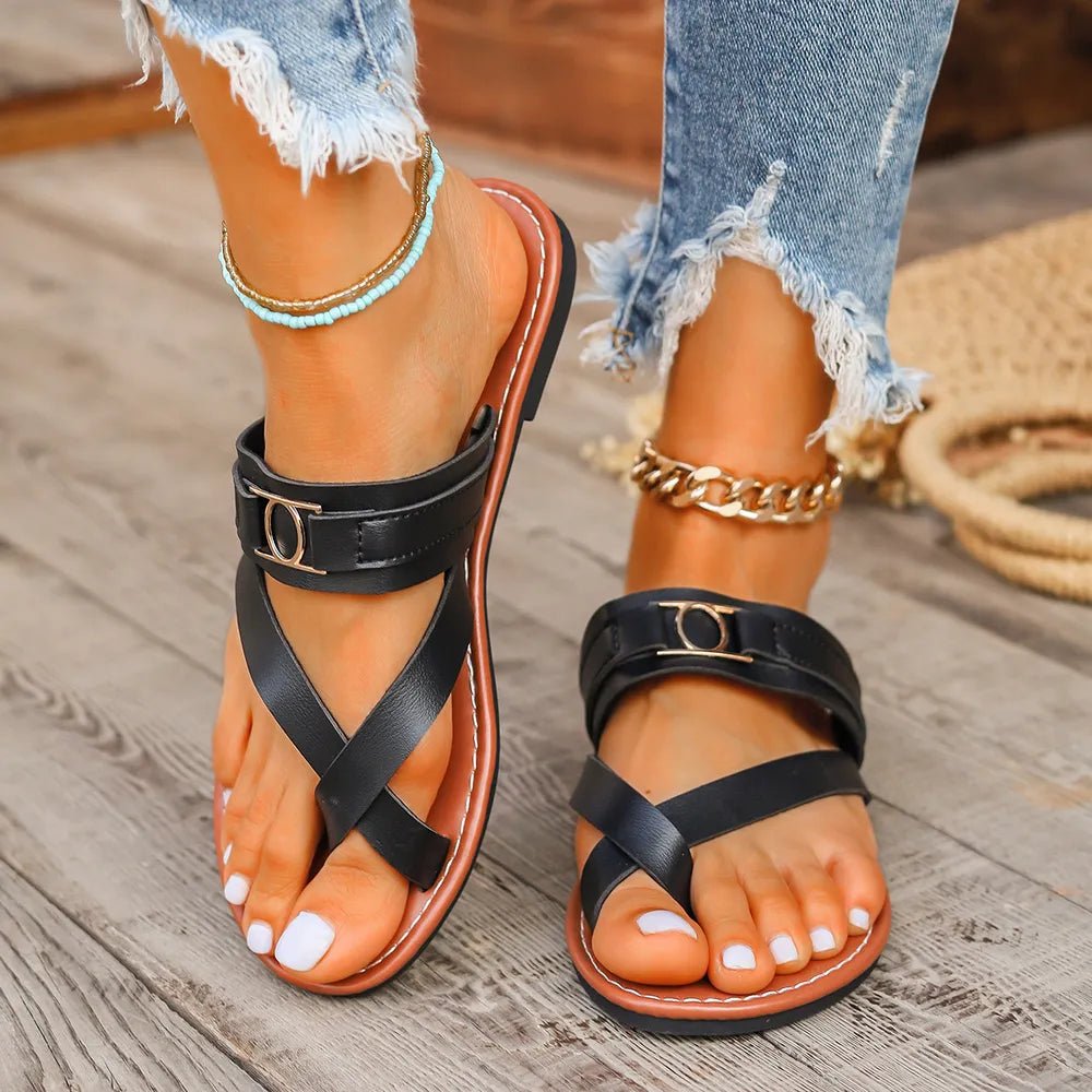 Women's minimalist toe loop flat sandals by Plush Fashion Hub, featuring simple design and comfortable slip-on style.