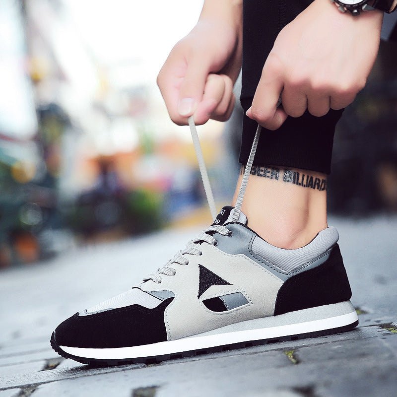 Men's breathable sport casual running sneakers in stylish design, featuring comfortable fit and lightweight construction.