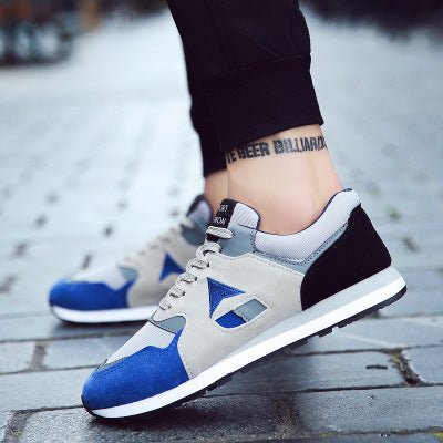 Trendy men's breathable sport casual running sneakers in black and white with cushioned soles and stylish design.