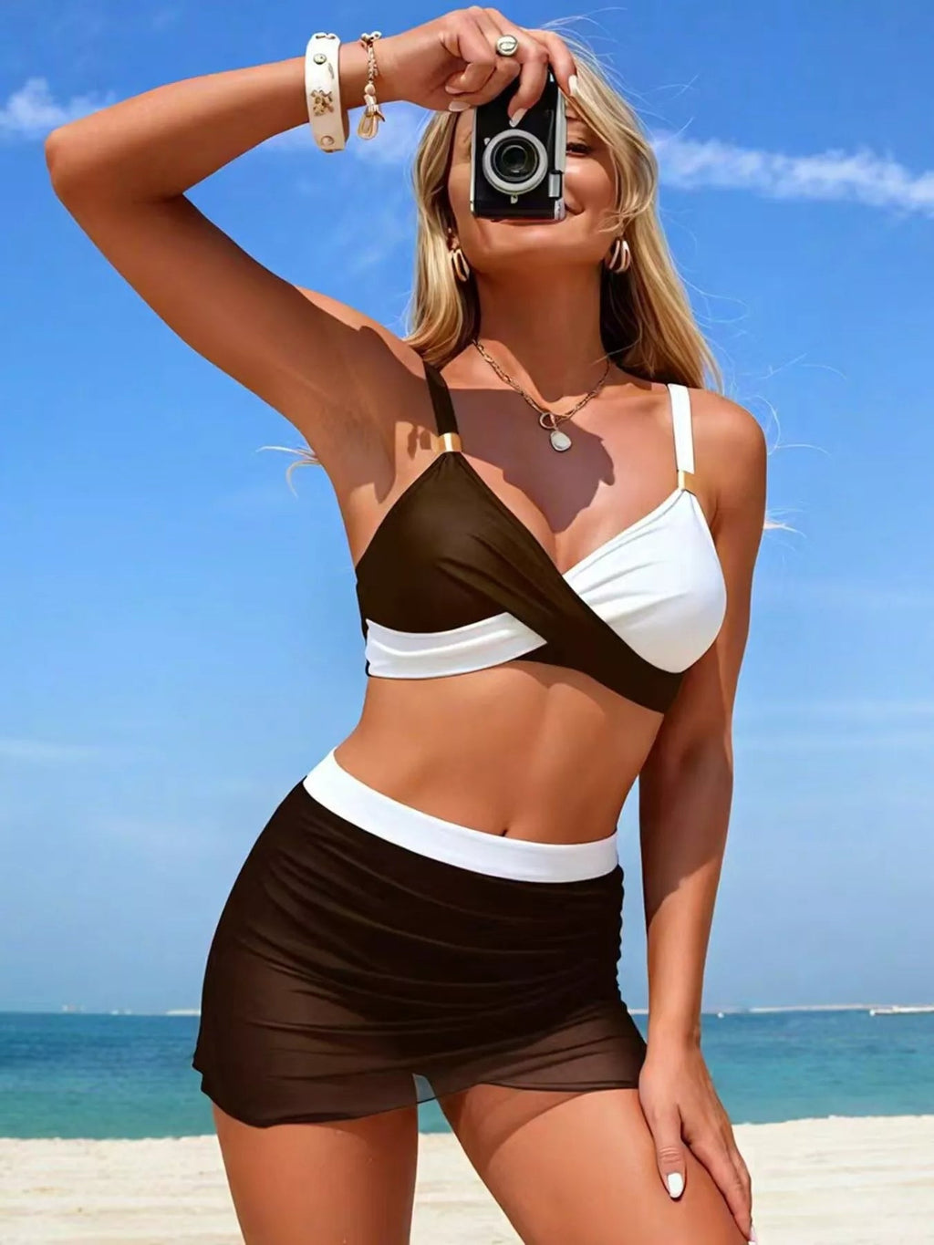 Two-tone cami and skort swim set for women, stylish two-piece swimwear, featuring a fitted cami top and matching skort for beach or pool.