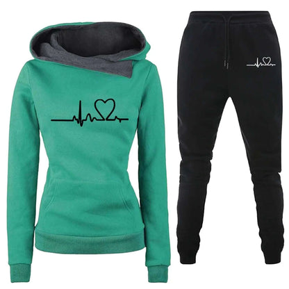 Women's Solid Color Thickened Hooded Draw String Jogger Pants SetStay warm and stylish with our Women's Solid Color Hooded Jogger Pants Set. These thickened joggers feature a drawstring for a perfect fit, while the cozy hood keepsSweatsuitsPlush Fashions ShopPlush Fashion Shop