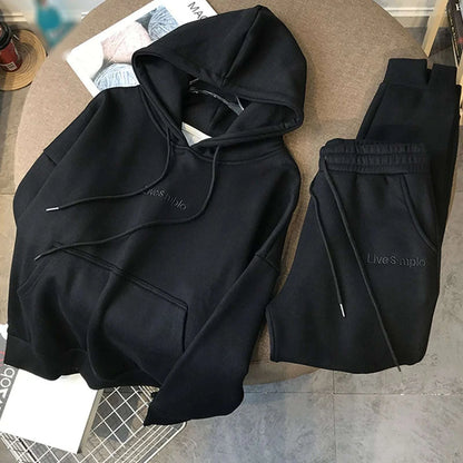 Women's Solid Color Thickened Hooded Draw String Jogger Pants SetStay warm and stylish with our Women's Solid Color Hooded Jogger Pants Set. These thickened joggers feature a drawstring for a perfect fit, while the cozy hood keepsSweatsuitsPlush Fashions ShopPlush Fashion Shop