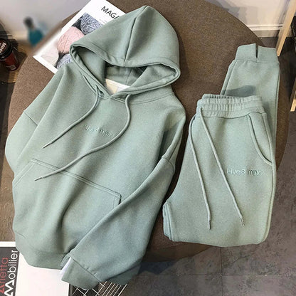 Women's Solid Color Thickened Hooded Draw String Jogger Pants SetStay warm and stylish with our Women's Solid Color Hooded Jogger Pants Set. These thickened joggers feature a drawstring for a perfect fit, while the cozy hood keepsSweatsuitsPlush Fashions ShopPlush Fashion Shop