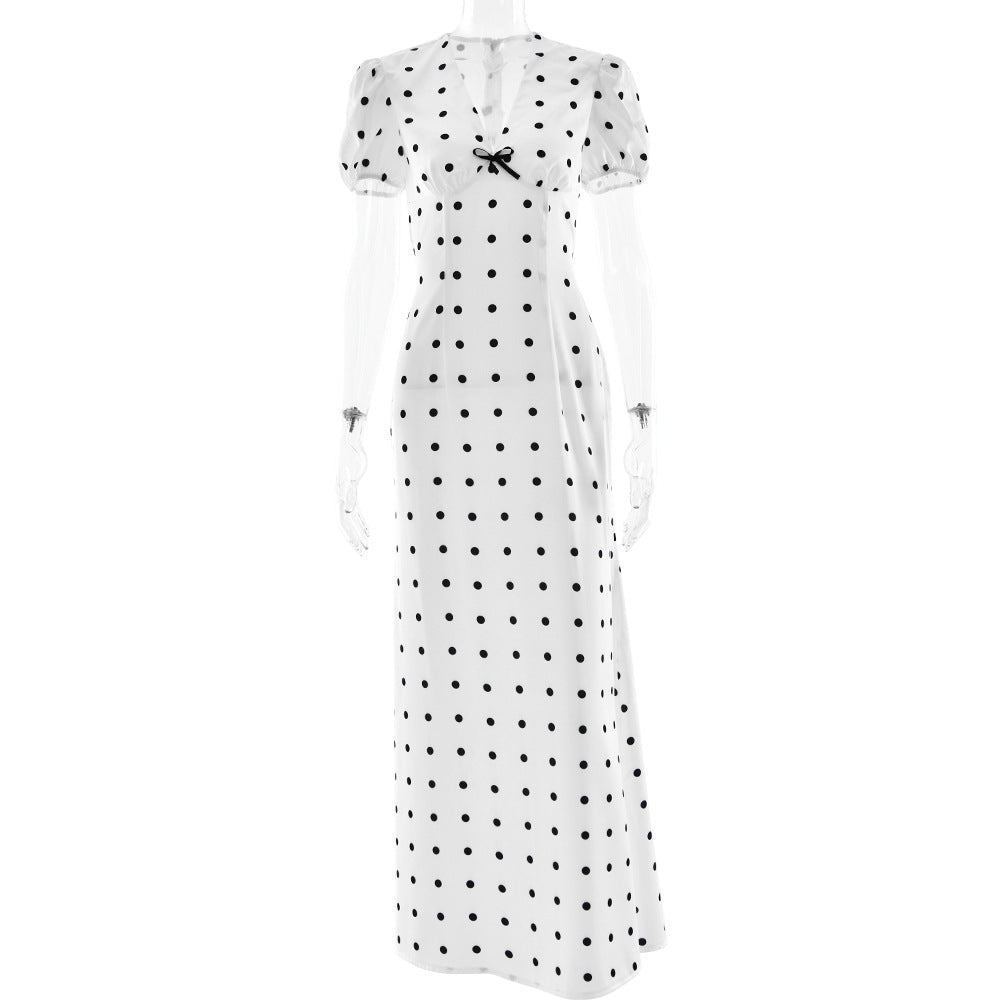 Bella Mia V-neck waist-controlled polka dot maxi dress with puff sleeves, lace-up detail, elegant and slim fit for formal occasions.