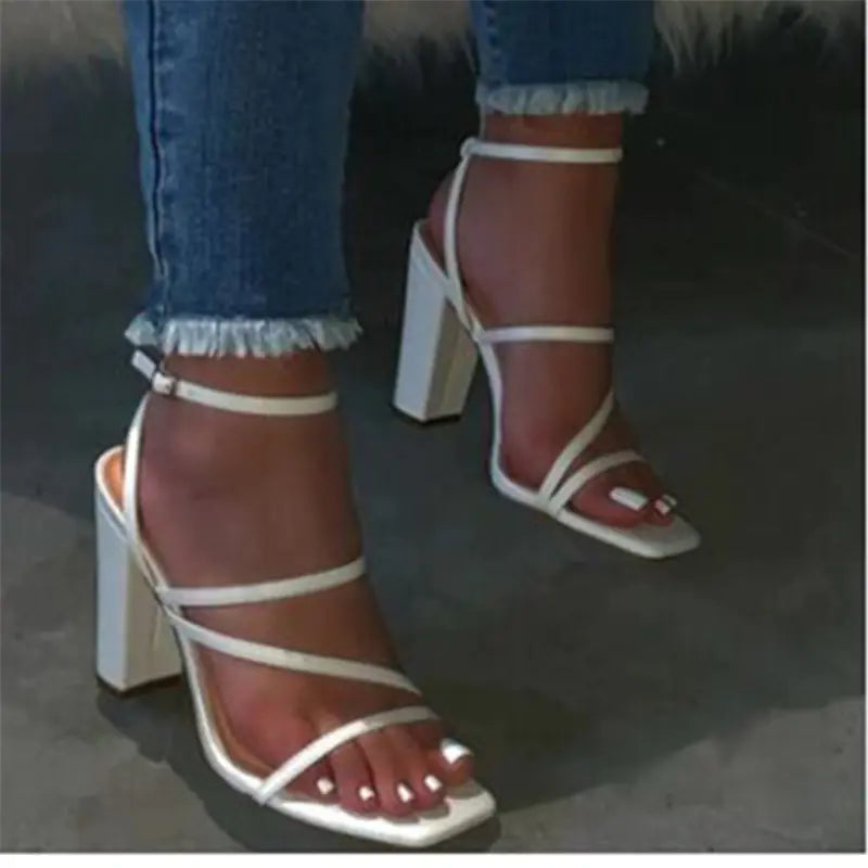 Women’s fashion sandals with thick heels, stylish slippers from Trendy Attic Store01, featuring open toe design and comfort fit.