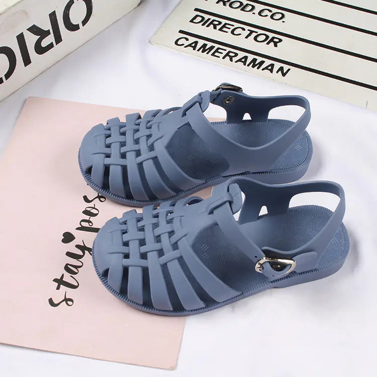 Girls hollow casual flat sandals from Trendy Attic Store01, featuring open toe design and breathable straps for comfortable wear.