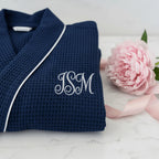Knee-length waffle robe for women by Lotus Linen, soft and cozy with a textured waffle pattern, perfect for lounging.
