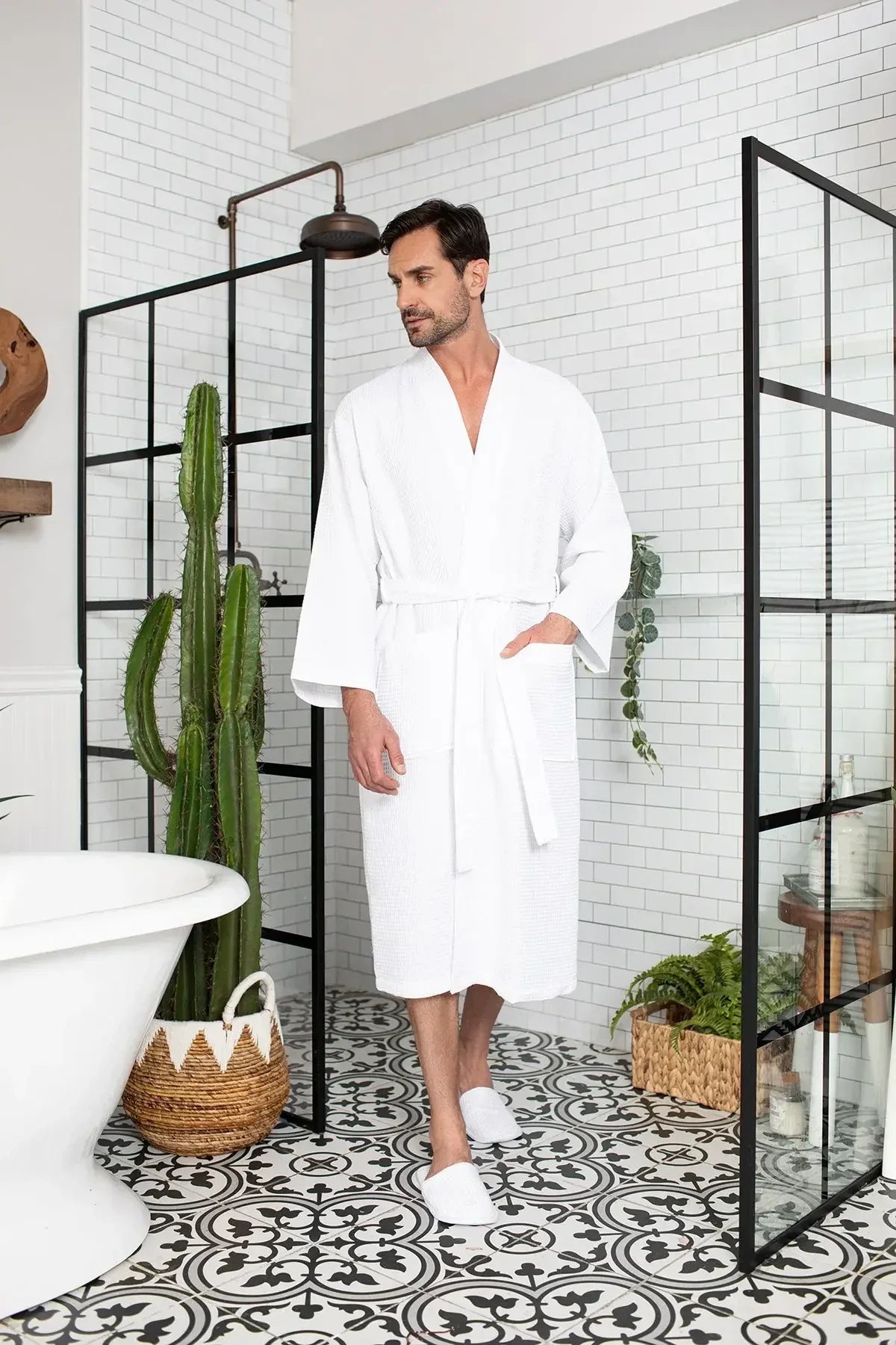 Lightweight, absorbent waffle spa bathrobe for men by Lotus Linen, shown hanging with a relaxed fit and textured fabric.