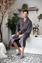 Waffle Spa Bathrobe for Men by Lotus Linen, lightweight and absorbent, shown hanging with a cozy, textured waffle fabric.