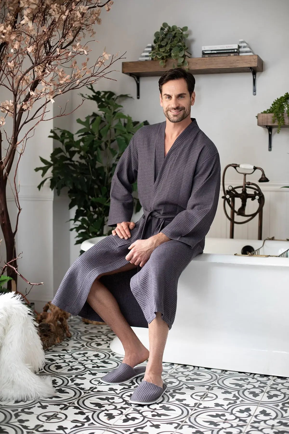 Waffle Spa Bathrobe for Men by Lotus Linen, lightweight and absorbent, shown hanging with a cozy, textured waffle fabric.