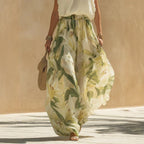 Casual FitiqueFit printed maxi dress with waist-cinching design and ruffle hem in size S to 3XL, perfect for summer wear.