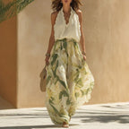 Plus size FitiqueFit printed maxi dress with waist-cinching design and ruffle hem, perfect for casualwear in sizes S to 3XL.