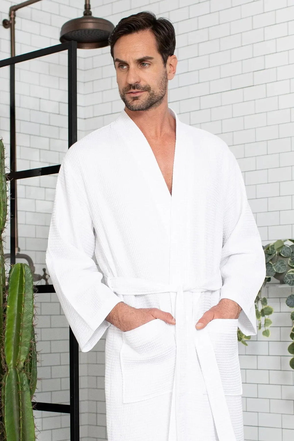 White Lotus Linen men's waffle spa bathrobe hanging open, showing lightweight, absorbent fabric and relaxed fit.