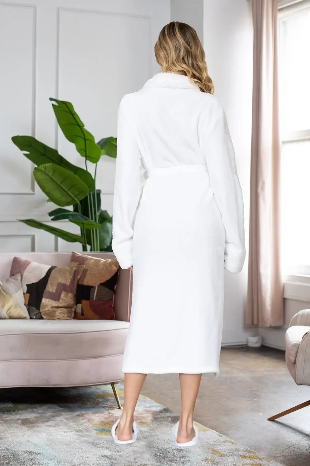 Women's ultra soft plush bathrobe by Lotus Linen, white plush robe with a cozy, comfortable fit and belt closure.