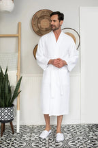 White Lotus Linen waffle spa bathrobe for men, absorbent and lightweight, shown hanging open with a relaxed fit.