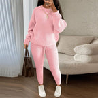 Winter ribbed knit women's clothing set featuring a loose pullover sweater and drawstring pants in a stylish, cozy design.