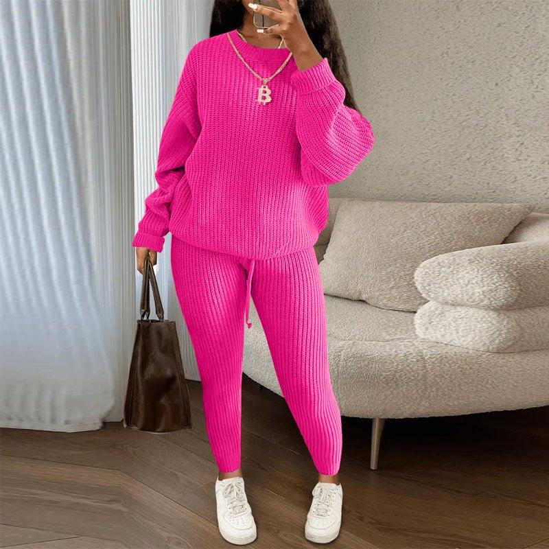 Winter ribbed knit women's clothing set with loose pullover sweater and drawstring pants, stylish and cozy for cold weather.