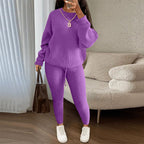Winter ribbed knit women’s clothing set featuring a loose pullover sweater and drawstring pants in cozy, stylish fabric.