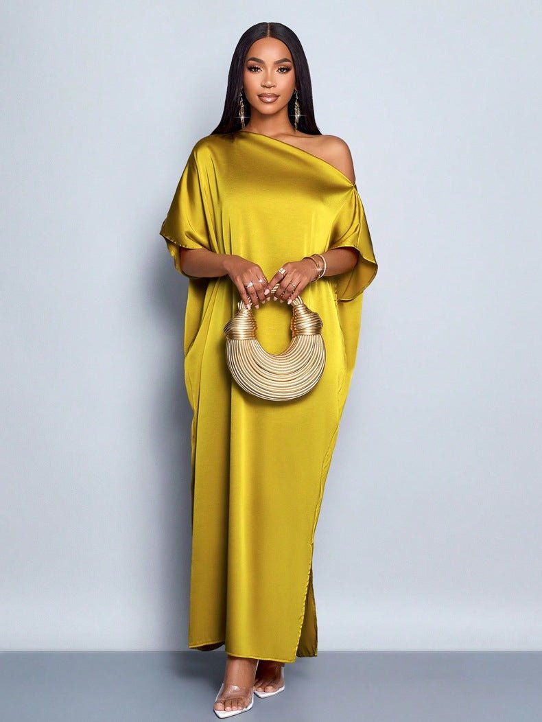 Yellow satin maxi dress for women by Bella Mia, perfect for early autumn, featuring a flowing, elegant design.