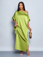 Yellow satin maxi dress for women by Bella Mia, featuring a stylish early autumn design and elegant flowy fabric.