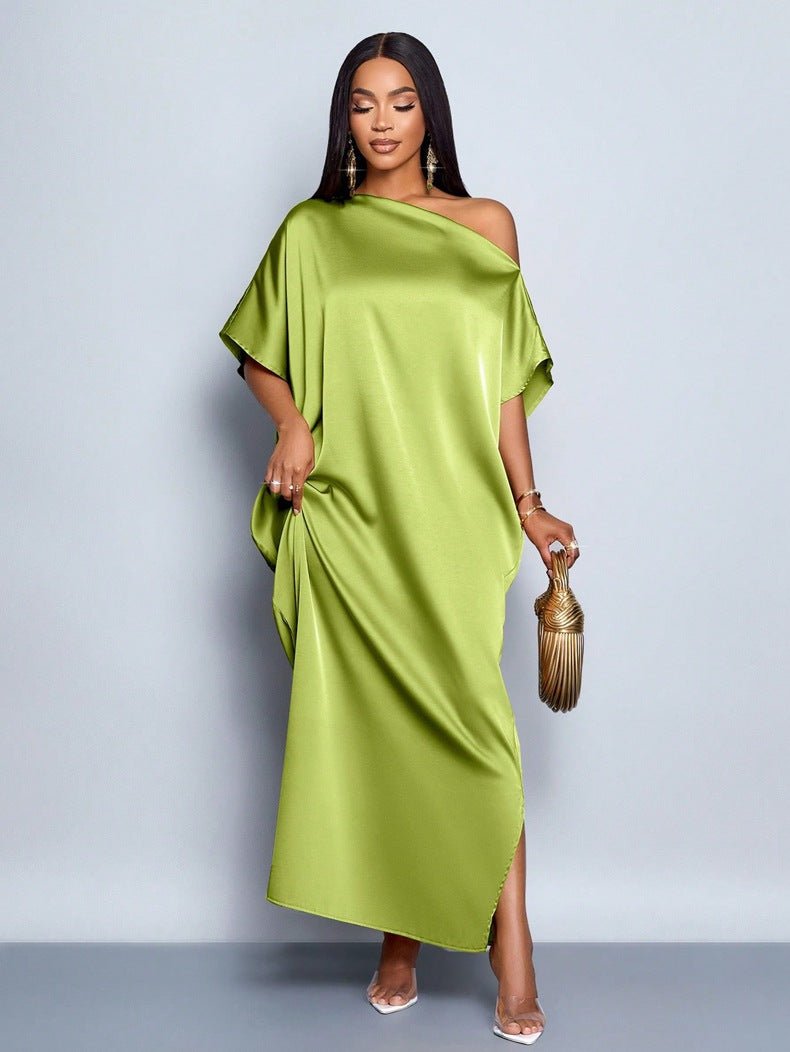 Yellow satin maxi dress for women by Bella Mia, featuring a stylish early autumn design and elegant flowy fabric.