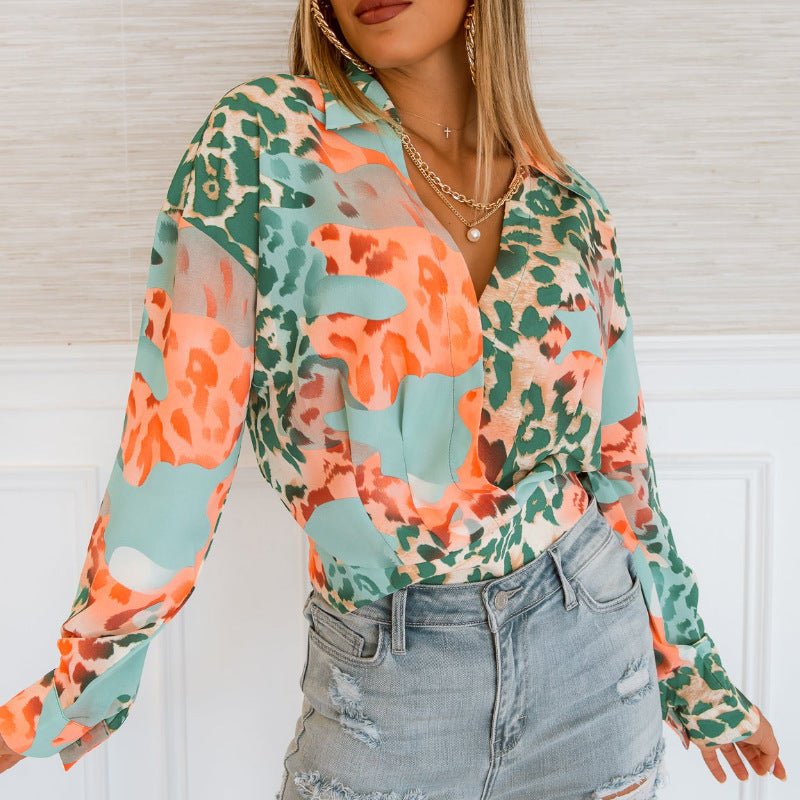 Women’s printed long sleeve shirt by Bella Mia featuring autumn and winter figure design, perfect for casual fall and winter wear.