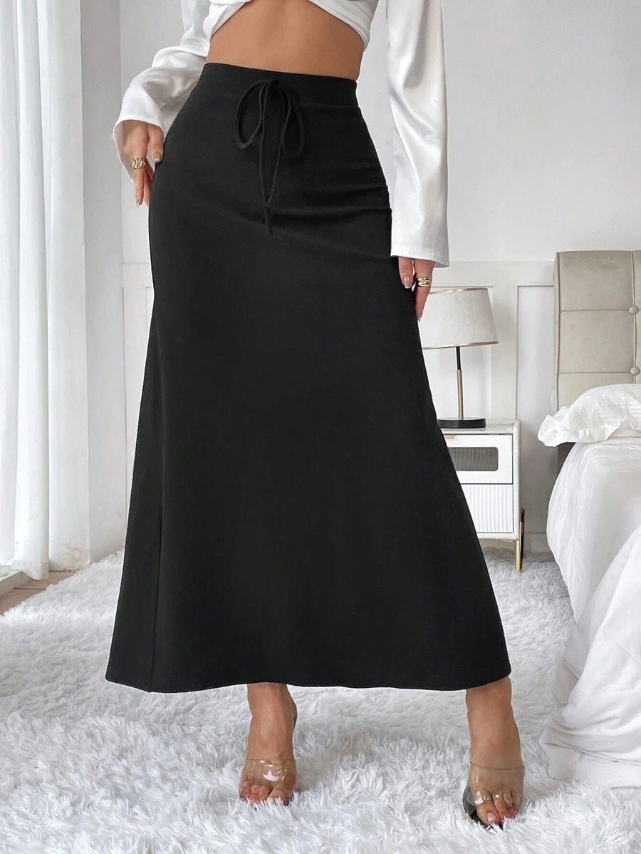 Elegant high-waist satin long skirt with lace-up design, suitable for spring and autumn, by Bella Mia.