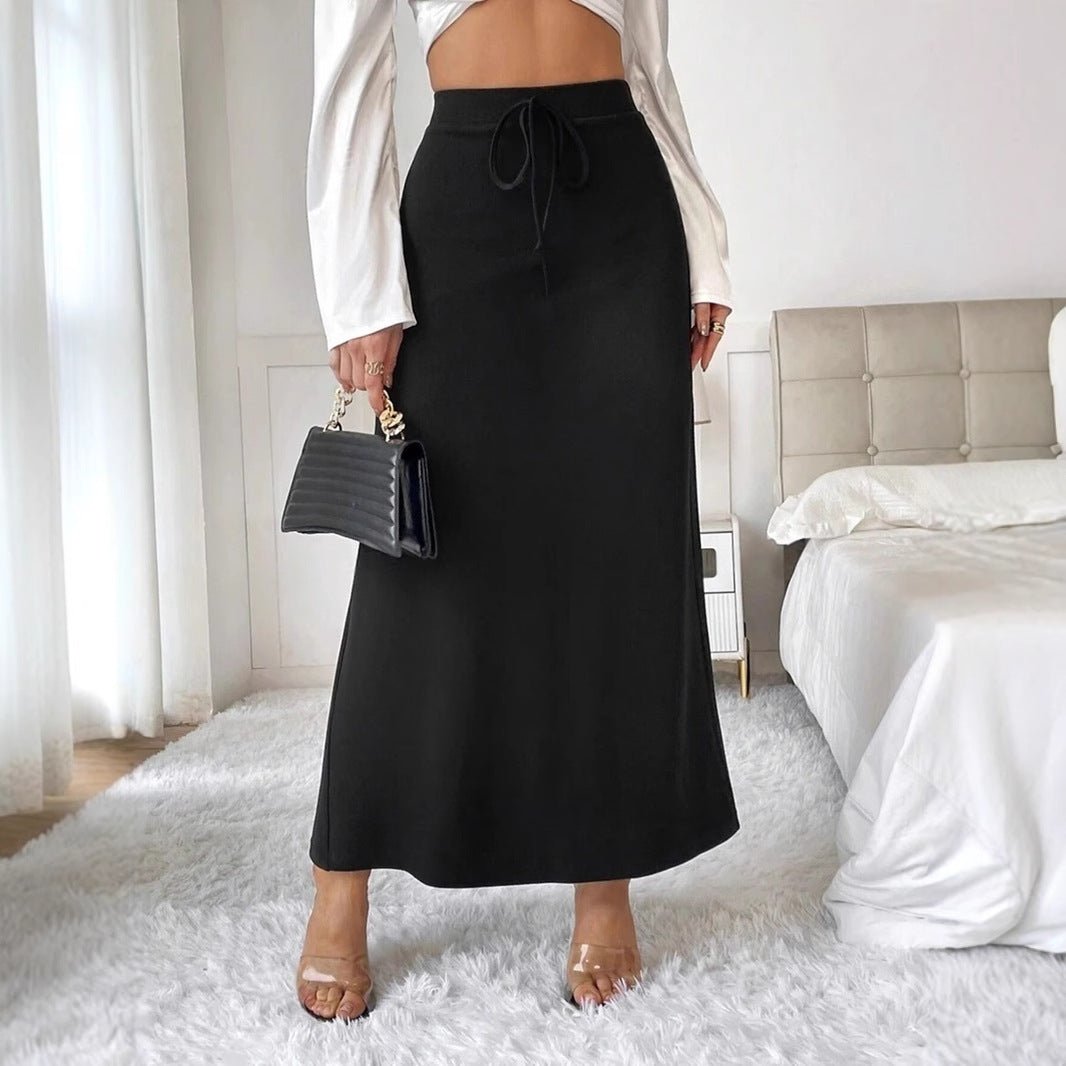Elegant women’s satin long skirt with high waist and lace-up detail, perfect for spring and autumn fashion by Bella Mia.