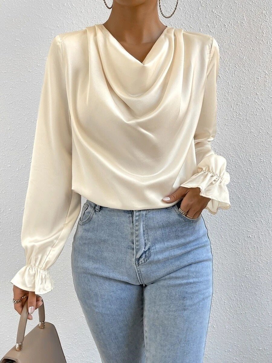 Women’s satin shirt with ruffled sleeves from Plush Fashion Hub, long sleeve design perfect for autumn fashion.
