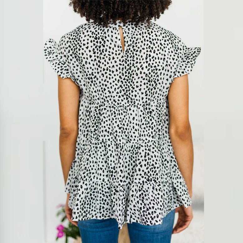 Women’s floral short sleeve swing top by Bella Mia, small size, lightweight women’s shirt with a feminine floral print.