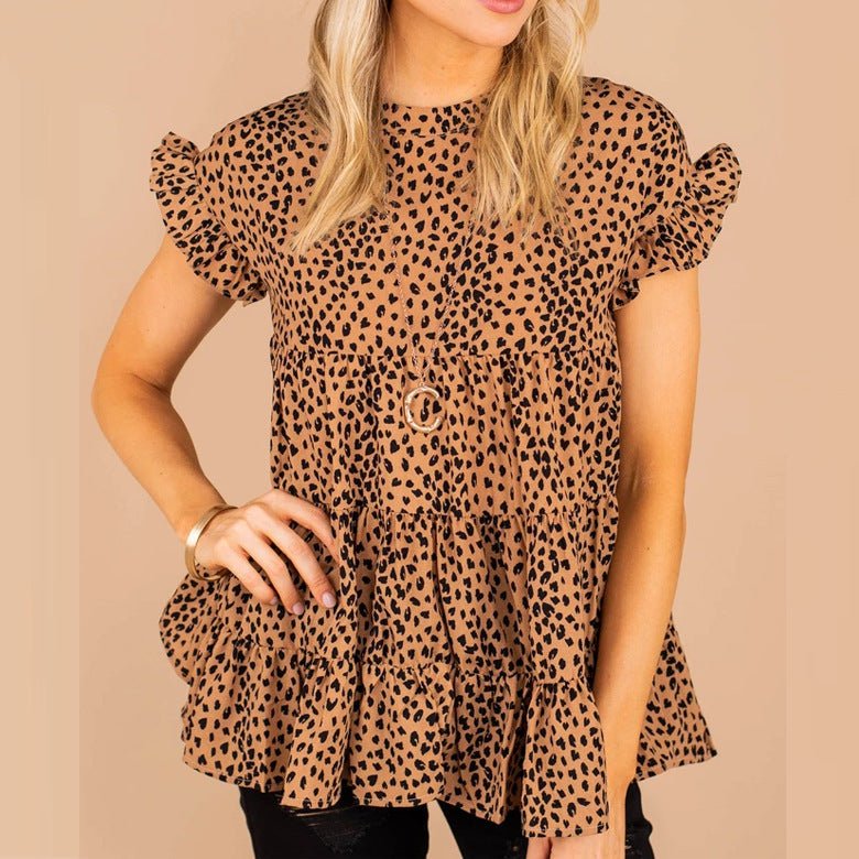 Women’s floral short sleeve swing top by Bella Mia, small size, perfect for casual wear, featuring a feminine design and lightweight fabric.