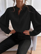 Elegant solid color women's long sleeve shirt by Bella Mia featuring a collared neckline, button closure, and loose fit for autumn.