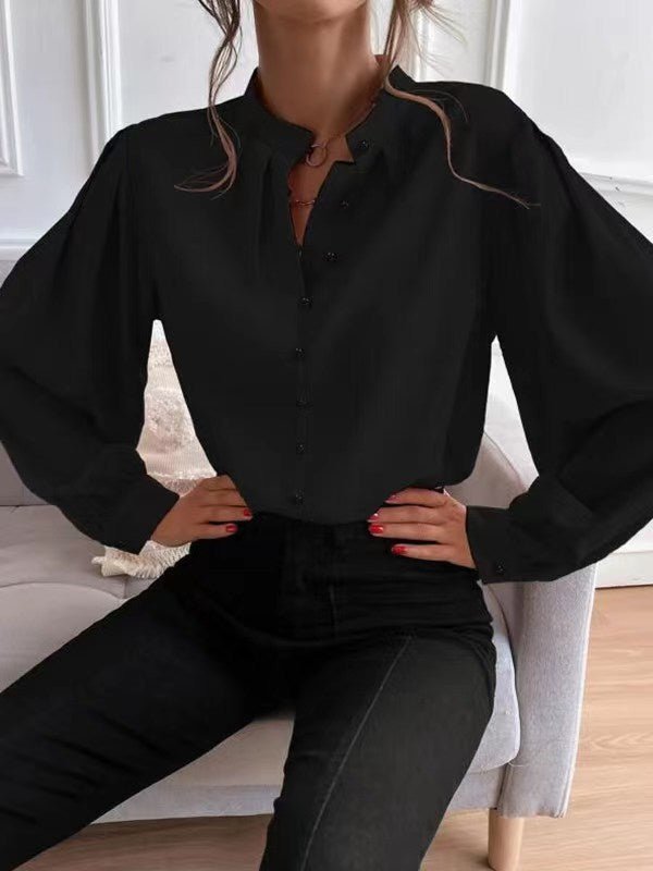 Elegant solid color women's long sleeve shirt by Bella Mia featuring a collared neckline, button closure, and loose fit for autumn.