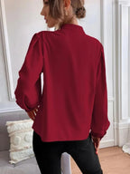 Elegant solid color women's long sleeve shirt with collar, buttons, and loose fit by Bella Mia, perfect for autumn.