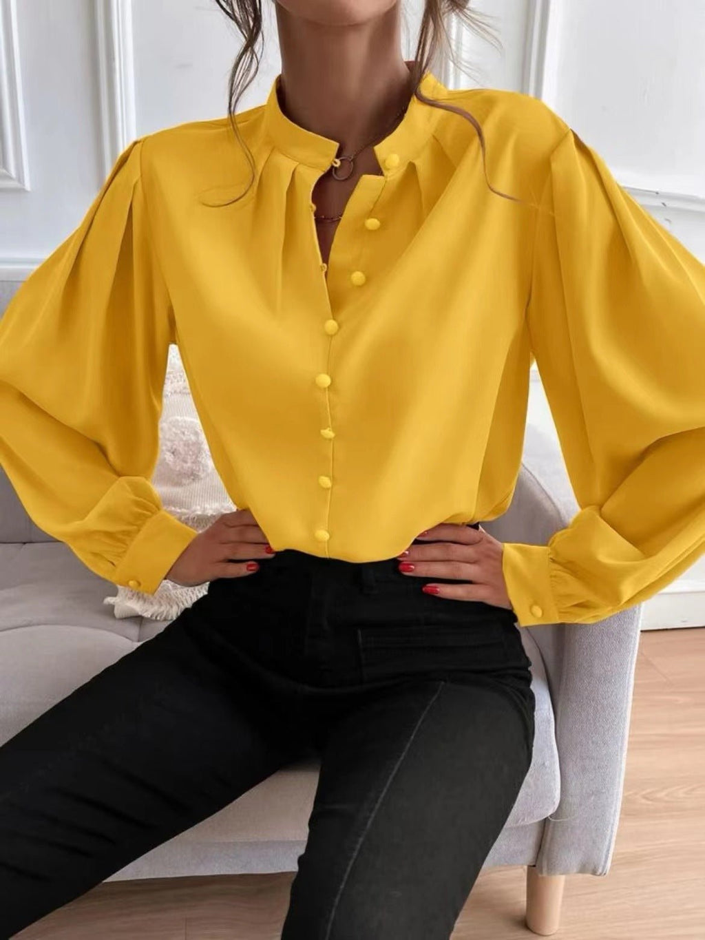 Elegant solid color women's long sleeve shirt with collar and button details, by Bella Mia, perfect for autumn.