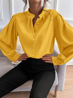 Elegant solid color women's long sleeve shirt with collar and button details, by Bella Mia, perfect for autumn.