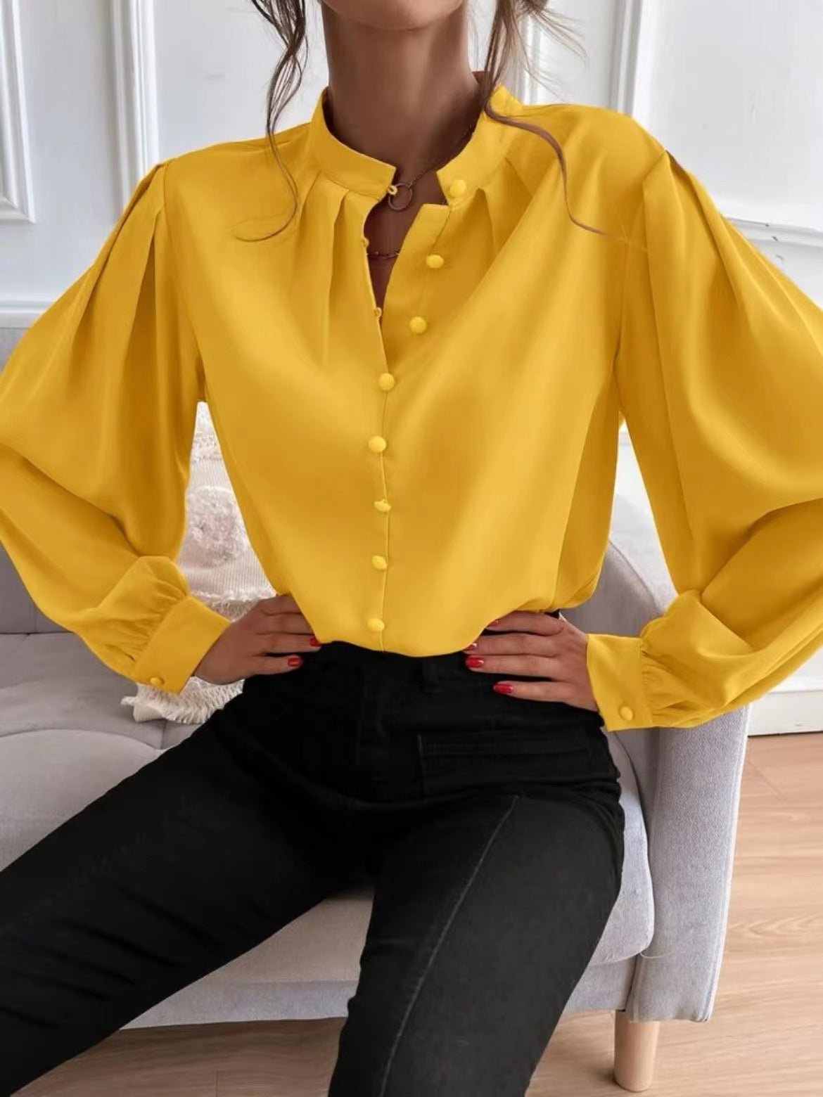 Elegant solid color women's long sleeve shirt with collar and button details, by Bella Mia, perfect for autumn.