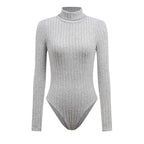 Women wearing Bella Mia knitted long sleeve turtleneck slim fit jumpsuit, showcasing the stylish bodysuit design and fitted silhouette.