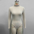 Women wearing Bella Mia knitted long sleeve turtleneck slim fit jumpsuit, showing the fitted bodysuit with long sleeves and turtleneck.
