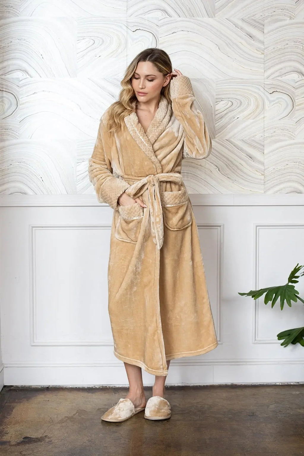 Soft plush women's bathrobe by Lotus Linen, featuring a cozy, ultra-soft fabric and relaxed fit, perfect for lounging and warmth.