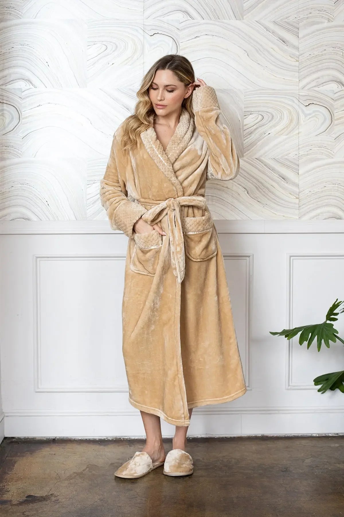 Soft plush women's bathrobe by Lotus Linen, featuring a cozy, ultra-soft fabric and relaxed fit, perfect for lounging and warmth.