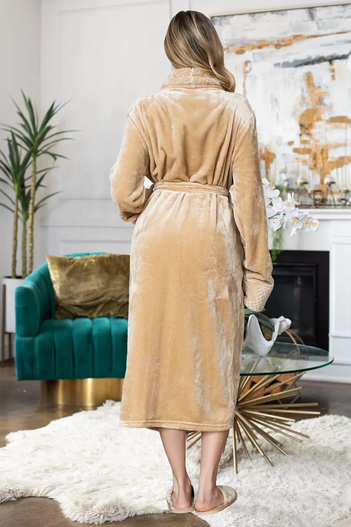 Women's ultra-soft plush bathrobe by Lotus Linen, featuring a cozy, fluffy fabric and a relaxed fit for comfort.