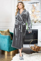 Women’s ultra-soft plush bathrobe by Lotus Linen, displayed in a cozy, relaxed fit with a shawl collar and tied waist.