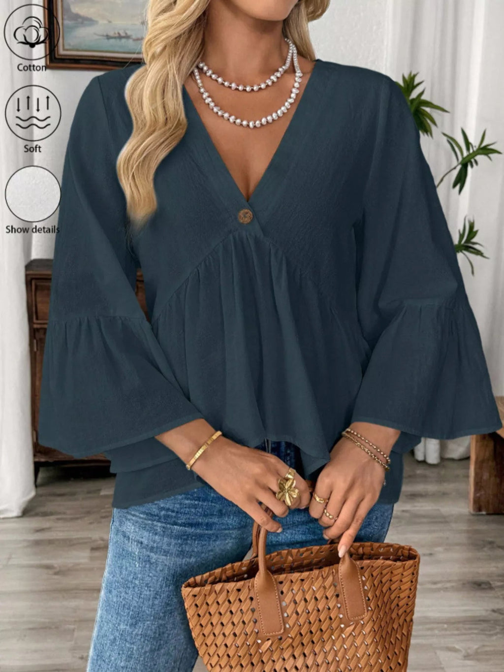Women's white cotton V-neck blouse with bell sleeves, trendy and effortless chic style, designed by Trendsi.