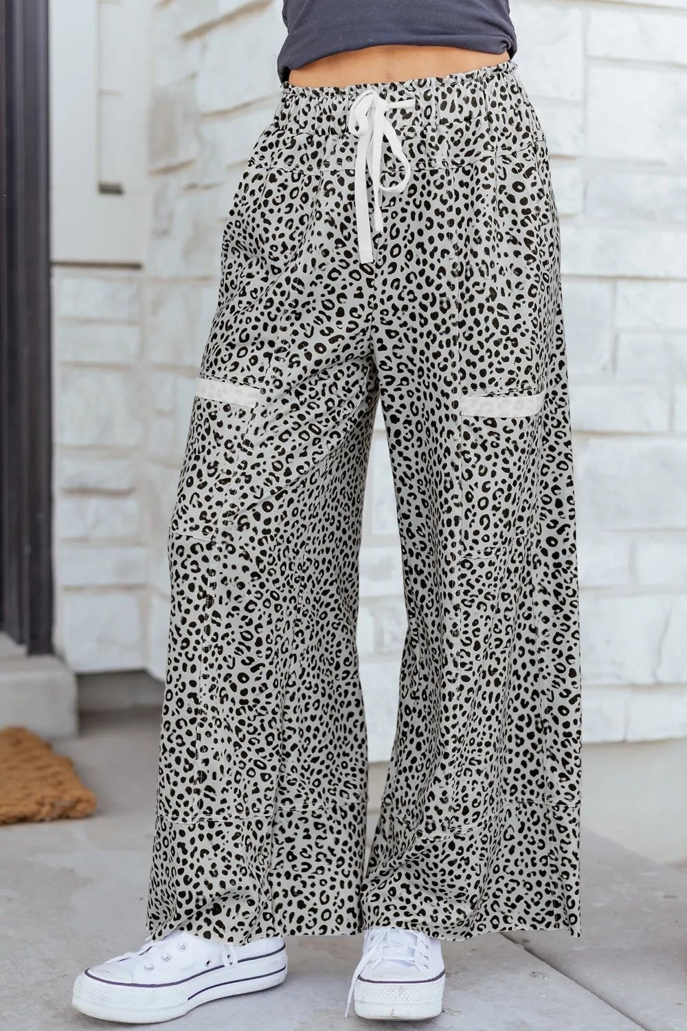 Women's animal print wide-leg terry knit pants with drawstring waist, casual and comfortable fashion by Trendsi.