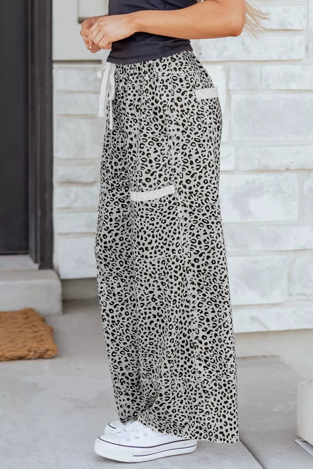 Women's animal print wide leg terry knit pants with drawstring waist, stylish and comfortable trendy pants for women.