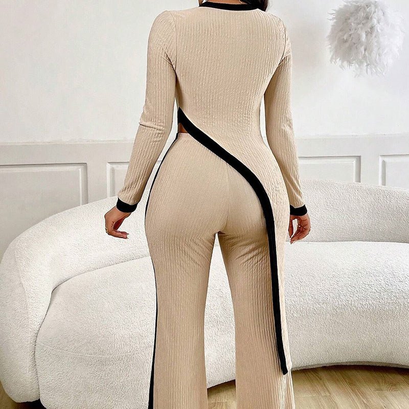 Women's casualwear asymmetrical top and pants set by FitiqueFit, featuring a stylish, modern design in soft fabric.