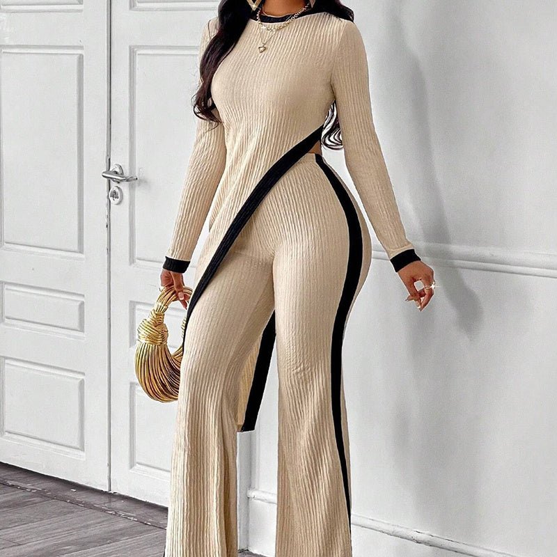 Women's asymmetrical top and pants casualwear set by FitiqueFit, featuring stylish, relaxed fit with modern design details.