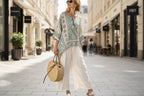 Women’s beach vacation two-piece casualwear set by FitiqueFit, featuring a loose summer outfit with crop top and shorts.